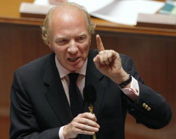 French Interior minister Brice Hortefeux delivers a speech on Sept. 15, 2009. Hortefeux has faced calls for his resignation from opposition politicians after he was caught on camera making remarks that critics described as racist. (Patrick Kovarik/AFP/Getty Images)