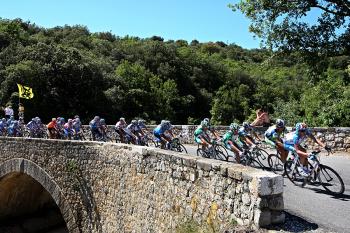 The peloton crosses an ancient bridge during Stage Fourteen of the 2008 Tour de France  (Jasper Juinen/Getty Images)