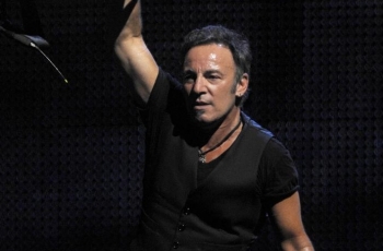 In this file photo, US rock musician Bruce Springsteen performs, on July 26, 2009, in the northern Spanish Basque city of Bilbao, during his first concert of the Spanish tour. (Rafa Rivas/AFP/Getty Images)