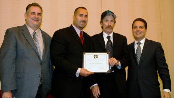 CABBIES HONORED: Left to right, Jim Hickey (VIP Taxi), outgoing IATR President Malachi Hull, IATR International Driver of the Year Thomas Chappelle, and incoming IATR President (and NYC TLC Commissioner/Chairman) Matthew W. Daus. (Courtesy Allan Fromberg)