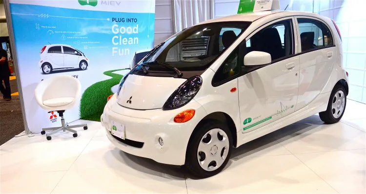 Mitsubishi shows off the i-MiEV at the Green Living Show in Toronto April 13, 2012. The i-MiEV, an electric car with a top speed of 130 km/hour and top range of 155 km. The Ontario government offers a rebate of over $8,000 for those that purchase the $32,000 vehicle. (Matthew Little/The Epoch Times)