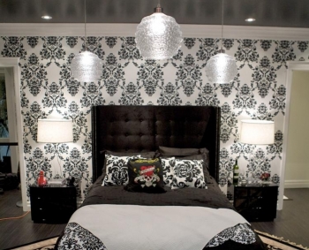 DRAMATIC: Black and white bedding accentuates the black ceiling in this bedroom designed by Janette Ewen. (Janette Ewen) DRAMATIC: Black and white bedding accentuates the black ceiling in this bedroom designed by Janette Ewen. (Janette Ewen)
