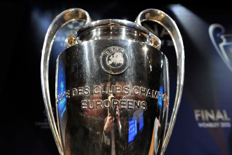 The UEFA Champions League trophy is displayed during the quarterfinals draw at the UEFA headquarters in Nyon, Switzerland March 15. The draw will feature classics such as Bayern against Juventus and surprise teams Malaga against Borussia Dortmund. (Cunningham/Getty Images)