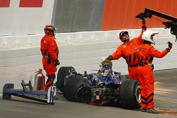 Mike Conway wrecked the Dreyer & Reinbold car just as Ryan Briscoe was entering the pits. Conway was not injured. (Chris McGrath/Getty Images) Mike Conway wrecked the Dreyer & Reinbold car just as Ryan Briscoe was entering the pits. Conway was not injured. (Chris McGrath/Getty Images)