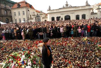 Thousands of Polish people observe a minute of silence as they pay their respects in memory of the victims of the air-crash in which President Lech Kaczynski was killed in front of the presidential palace in Warsaw on April 11, 2010. (Joe Klamar/AFP/Getty Images) Thousands of Polish people observe a minute of silence as they pay their respects in memory of the victims of the air-crash in which President Lech Kaczynski was killed in front of the presidential palace in Warsaw on April 11, 2010. (Joe Klamar/AFP/Getty Images)