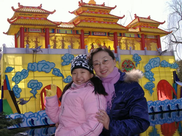 Cui Aimin enjoys time with her daughter in China before her arbitrary detention in late October this year. She now is at risk of trial and long term detention and torture, unless the authorities are compelled to release her. (Courtesy of Lucy Cui)