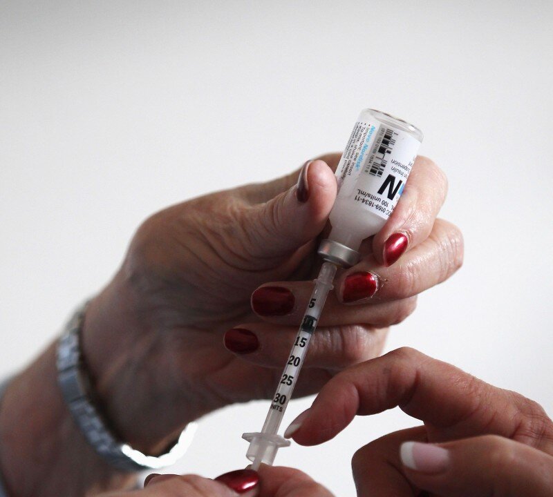 A nurse teaches a diabetes patient how to do her own insulin injections. A new national survey shows Canadian diabetes patients are most concerned with blindness and amputations as major health complications resulting from the disease while doctors are more worried about heart and kidney failure. (John Moore/Getty Images)