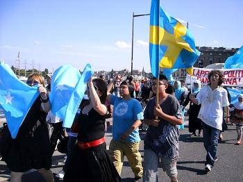Ms. Dilala Reheman, a witness of the July 5, 2009 violence, participates in a protest in Sweden on July 5, 2010. (Courtesy of Dilshat Rishit) Ms. Dilala Reheman, a witness of the July 5, 2009 violence, participates in a protest in Sweden on July 5, 2010. (Courtesy of Dilshat Rishit)
