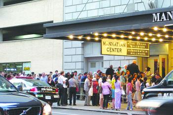 EAGER WAIT: A long line waits for entry to the Divine Performing Arts show in Manhattan's Hammerstein Ballroom on August 24. The show was packed to capacity. (Suman Srinivasan/Epoch Times) EAGER WAIT: A long line waits for entry to the Divine Performing Arts show in Manhattan's Hammerstein Ballroom on August 24. The show was packed to capacity. (Suman Srinivasan/Epoch Times)