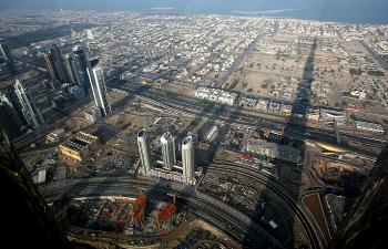 Burj Dubai, the world's tallest tower casts its shadow over the city, on January 04, 2010. (Karim Sahib/AFP/Getty Images) Burj Dubai, the world's tallest tower casts its shadow over the city, on January 04, 2010. (Karim Sahib/AFP/Getty Images)