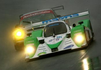 Guy Smith in the #16 Dyson Lola Mazda B09 leads Wolf Henzler in the #87 GT2 Farnbacher Loles Porsche 911 GT3 RSR during Petit Le Mans. (Darrell Ingham/Getty Images) Guy Smith in the #16 Dyson Lola Mazda B09 leads Wolf Henzler in the #87 GT2 Farnbacher Loles Porsche 911 GT3 RSR during Petit Le Mans. (Darrell Ingham/Getty Images)
