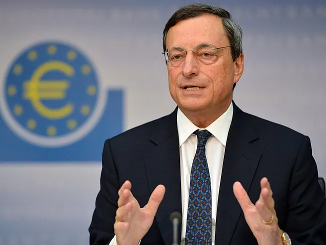 Mario Draghi, president of the European Central Bank (ECB), addresses the media following a meeting with the ECB's council in Frankfurt, Germany, Sept. 6. The ECB unveiled a fresh program to buy bonds issued by heavily indebted eurozone countries in a bid to save the euro. (Johannes Eisele/AFP/GettyImages)