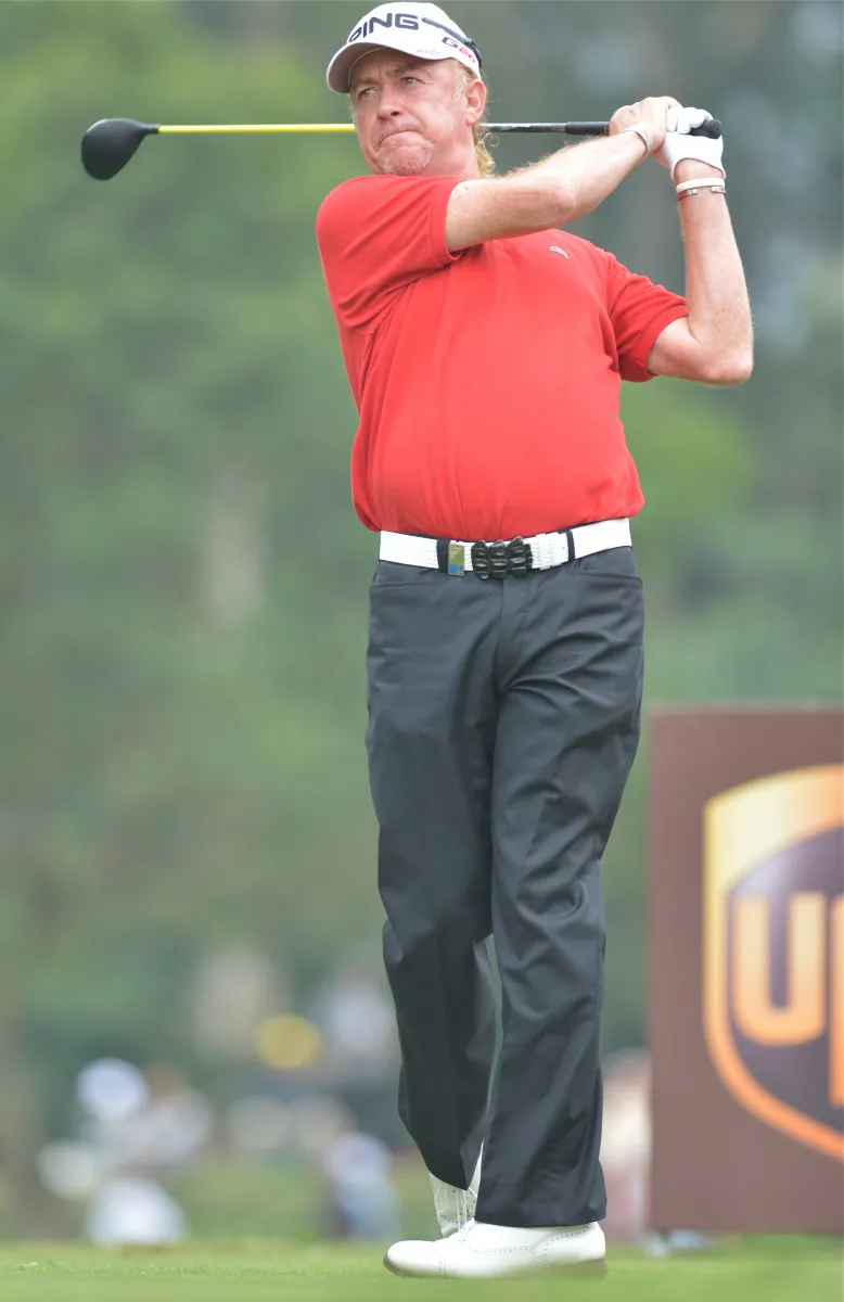 Miguel Jimenez celebrates winning the UBS Hong Kong Golf Open 2012 for the third time after tapping in his winning putt on the 18th green. At 48, he becomes the oldest-ever winner of a European Tour Tournament. (Bill Cox/The Epoch Times)