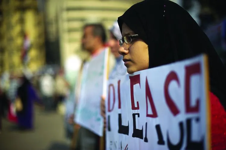 Anti-military rule protestors—hoping not to lose the gains made in ousting the Hosni Mubarak regime—attend a demonstration in Cairo's Tahrir Square on Dec. 2. (Odd Andersen/AFP/Getty Images)