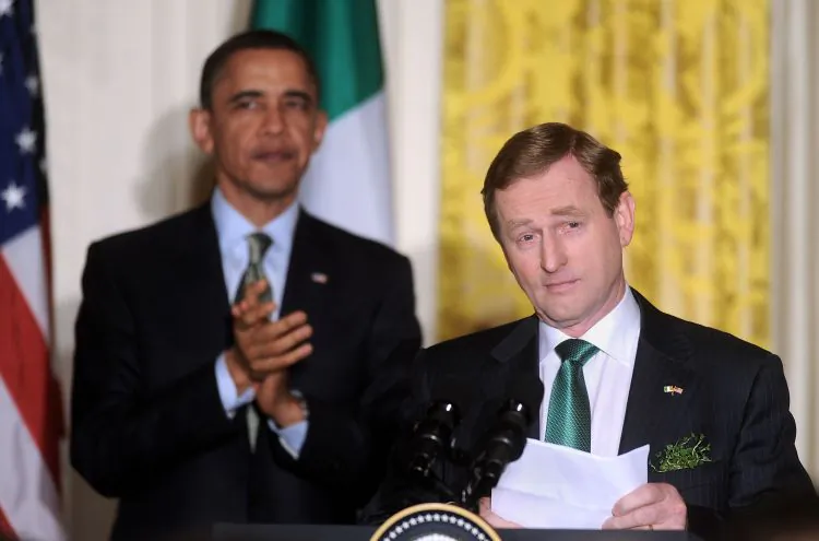 Irish Prime Minister Enda Kenny speaks alongside US President Barack Obama during a St. Patrick's Day reception in the East Room of the White House in Washington, DC, March 17, 2011. (Photo by Olivier Douliery-Pool/Getty Images)
