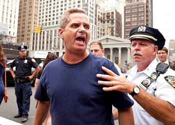 ENRAGED: A passerby becomes enraged when he learns that a press conference held Thursday supports the right of Muslims to build a mosque near Ground Zero. (The Epoch Times) ENRAGED: A passerby becomes enraged when he learns that a press conference held Thursday supports the right of Muslims to build a mosque near Ground Zero. (The Epoch Times)