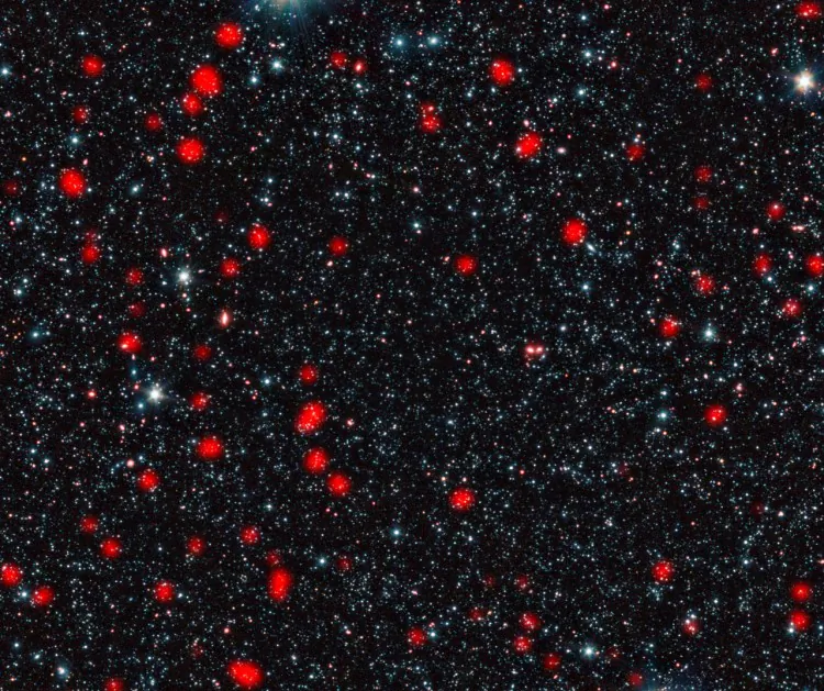 Distant galaxies undergoing the most intense type of star formation activity known, called a starburst. (ESO, APEX (MPIfR/ESO/OSO), A. Weiss et al., NASA Spitzer Science Center)