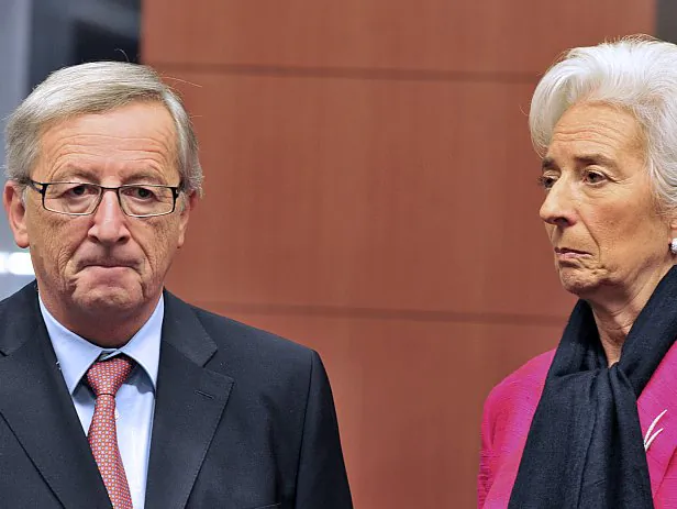 Eurogroup chairman and Luxembourg Prime Minister Jean-Claude Juncker (L) speaks with International Monetary Fund Managing Director Christine Lagarde (R) prior a eurozone meeting on Nov. 12, 2012, at the EU Headquarters in Brussels, Belgium. Eurozone finance ministers consider the next steps to bring Greece back from the brink of bankruptcy after Athens received a 'positive' report card from its international creditors. ( Georges Gobet/AFP/Getty Images)