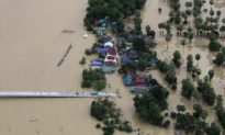 Asia Floods Claim at Least 117 Lives