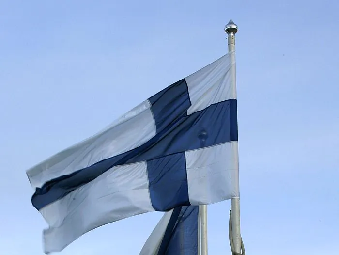 Finnish flag (front), together with European Union country flags, in Lahti, Finland, in a file photo. (Gerard Cerles/AFP/Getty Images)