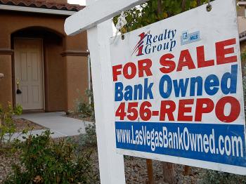 A sign hangs outside a foreclosed home in North Las Vegas, Nevada, where one in every 74 homes is in foreclosure. (Ethan Miller/Getty Images)