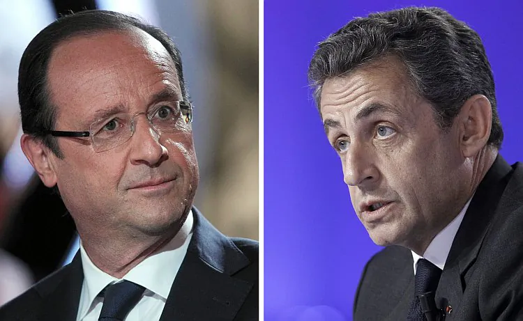 French Socialist Party candidate Francois Hollande (L) and incumbent President Nicolas Sarkozy will face off in France's first round of presidential elections on Sunday. (Kenzo Tribouillard/AFP/Getty Images)