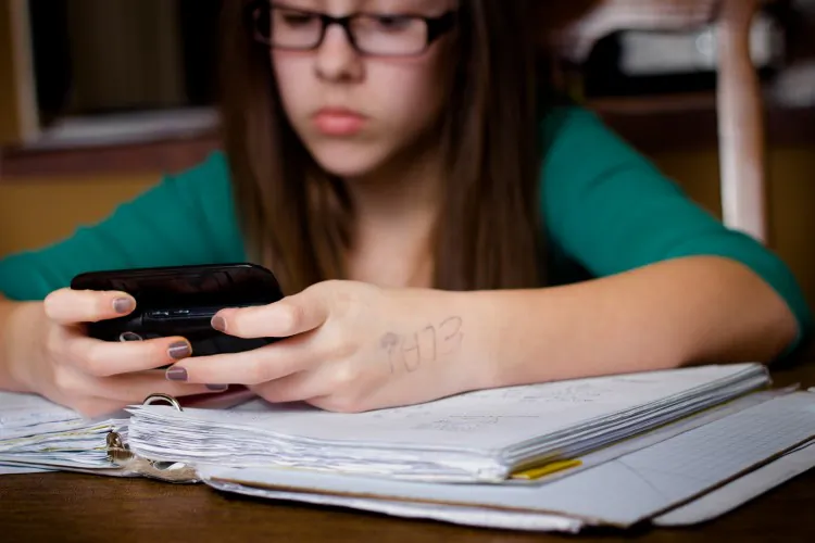 Younger university students are easily distracted by social media and texting, according to new research. (Littleny/Dreamstime.com)
