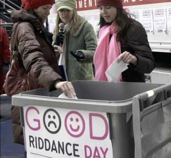 Good Riddance Day: The bad memories of 2010 went into a Dumpster and a shredder on Tuesday on Times Square. The annual Good Riddance day has been celebrated for the past four years. (Phoebe Zheng/The Epoch Times)