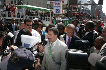 The Gov: Governor David Paterson stops to address the crowd at the African American Day Parade in Harlem on Sunday. (Tim McDevitt/ Epoch Times)
