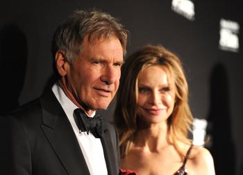 Harrison Ford (L) is selling his New York City penthouse for $16 million, the blog The Real Estalker reports. (Michael Buckner/Getty Images)