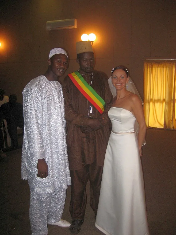 Lainie Towell and Fodé Mohamed Soumah (L) on their wedding day in Guinea, West Africa, in 2007. Towell’s efforts to bring attention to her own case of marriage fraud may have contributed to tighter laws currently being introduced by the Canadian government to deter marriages of convenience. (Photo courtesy of Lainie Towell)