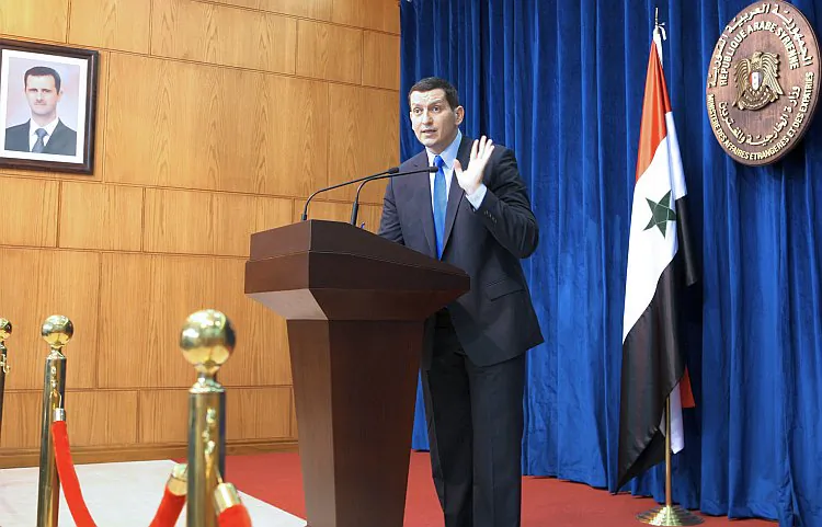 Syrian foreign ministry spokesman Jihad al-Makdissi addresses journalists in Damascus on May 27, 2012. (Louai Beshara/AFP/GettyImages)