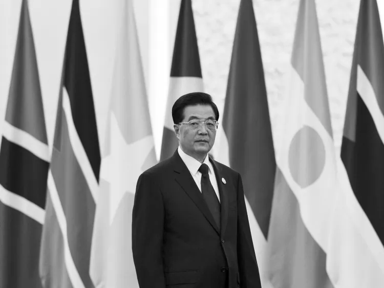 Chinese Communist Party leader Hu Jintao arrives for a group photo session in Beijing on July 19. Hu will retain control over the military after stepping down as party head early next year, according to a Party official. (Andy Wong/Pool/Getty Images)