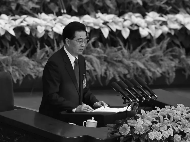 Chinese President Hu Jintao speaks during the opening session of the 18th Communist Party Congress held at the Great Hall of the People on November 8, 2012 in Beijing, China. Hu's report to the Congress laid out economic goals that one economist told The Epoch Times were "just propaganda." (Feng Li/Getty Images)