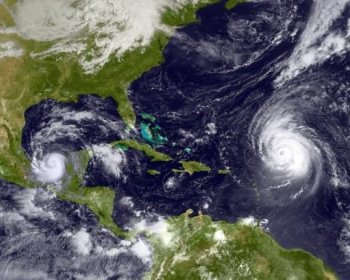 Hurricanes Karl, Julia, and Igor are seen in the Atlantic Ocean September 16, 2010 as seen from space. (NOAA via Getty Images)