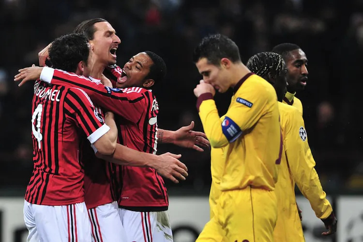 AC Milan’s Zlatan Ibrahimovic celebrates his goal in a Champions League hammering of Arsenal on Wednesday in Italy. (Giuseppe Cacace/AFP/Getty Images)