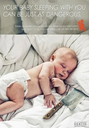 Poster of infant sleeping with knife spurs a national debate over appropriateness of shock value. (City of Milwaukee/Department of Health)