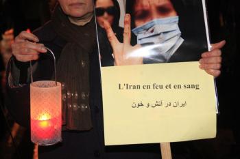 Dozens of supporters of the Iranian opposition demonstrate on December 29, 2009 in Paris. (Mehdi Fedouach/AFP/Getty Images)