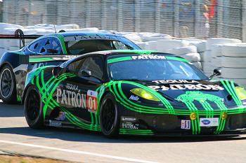 The RSR Jaguar team (L) and Extreme Motorsports Ferrari need to break out of the back of the GT pack. (James Fish/The Epoch Times) The RSR Jaguar team (L) and Extreme Motorsports Ferrari need to break out of the back of the GT pack. (James Fish/The Epoch Times)