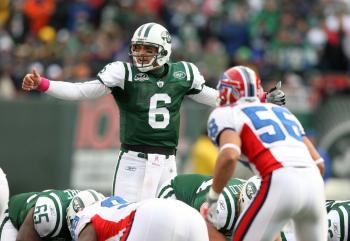 New York Jets quarterback Mark Sanchez is not expected to see too much action given his sore shoulder and a playoff spot locked up. (Al Bello/Getty Images)