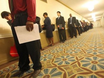 Job seekers line up to attend a job fair September 29, 2010 in New York City. American companies have also increased the offshoring of skilled, professional service sector employees. (Mario Tama/Getty Images)
