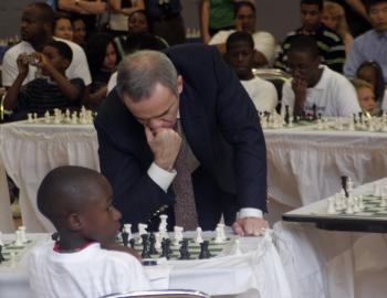 One against 20: Chess Master Garry Kasparov played a 20 game simultaneous chess match against Harlem students at the Harlem Children’s Zone on Sunday. Kasparov defeated all challengers. (Tim McDevitt/ Epoch Times)