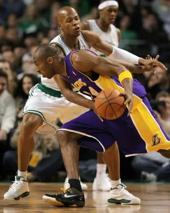 THE MATCHUP: Kobe Bryant takes on Ray Allen. The Lakers beat the Celtics 110–109 in Boston on Thursday. (Elsa/Getty Images)