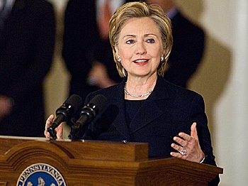 Despite the achievements of Sen. Clinton and Governor Palin, most women still earn less pay than their male counterparts. (Common Wealth Media Service/Getty Images)