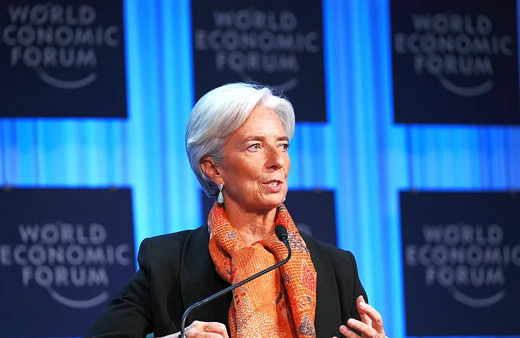 Christine Lagarde of France, managing director of International Monetary Fund (IMF), arrives to address participants about Global Economic Outlook 2012, on Jan. 28, during the World Economic Forum (WEF) in the Swiss resort of Davos. (Vincenzo Pinto/AFP/Getty Images)