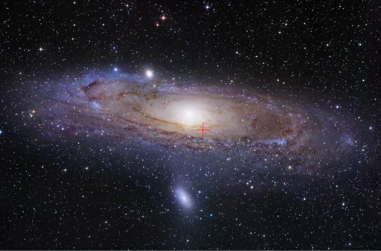 The Andromeda Galaxy (M31): Crosshairs show location of microquasar. (Robert Gendler, © 2005 and used with permission. www.robgendlerastropics.com)
