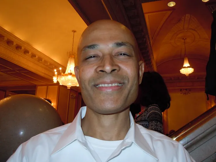 Narendra Maharaj is smiling after seeing Shen Yun. When he tried to express how the show made him feel, Mr. Maharaj became emotional. (Stephanie Lam/The Epoch Times)