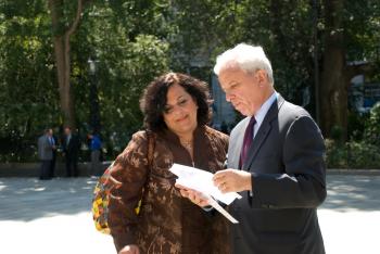ROSA PARKS OF DOMESTIC VIOLENCE: Public advocate candidate Mark Green speaks with Rosa Schirripa, a woman who inspired him to draft legislation to protect domestic violence victims in the workplace. (Helena Zhu/The Epoch Times)
