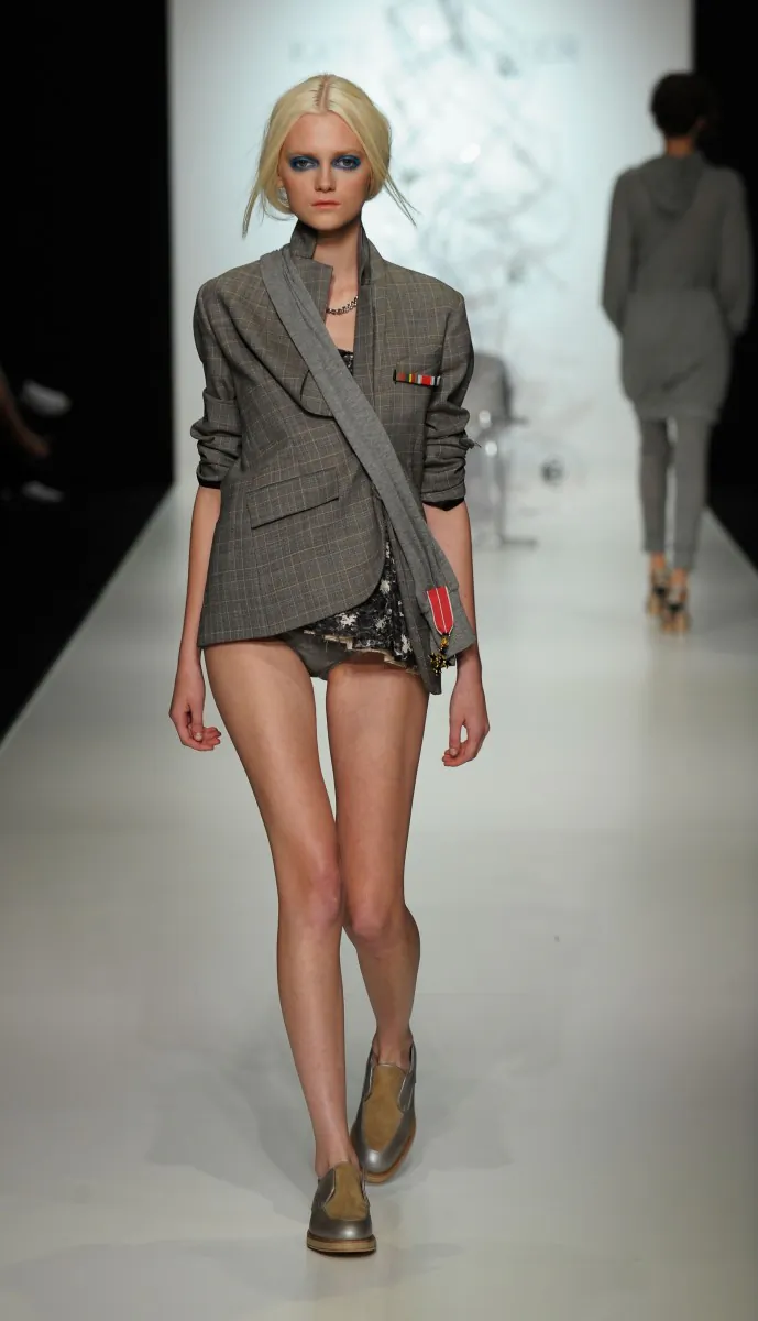 A model showcases an outfit by designer Kate Sylvester, April 29, 2008 in Sydney, Australia. (Photo by Stefan Gosatti/Getty Images)
