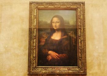 Mona Lisa code--An Italian art historian and sleuth said there are codes in the eye's of Leonardo's famous painting. (Pascal Le Segretain/Getty Images)